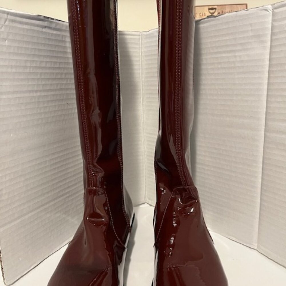 Locale Genica patent leather tall boots.